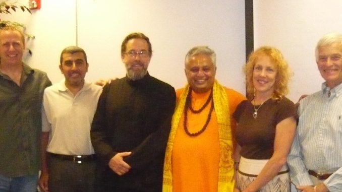 At panel discussion on “God” in Nevada, from left to right are— Jon Eric Johnson, Sherif A. Elfass, Stephen Karcher, Rajan Zed, ElizaBeth W. Beyer and Jikai’ Phil Bryan.